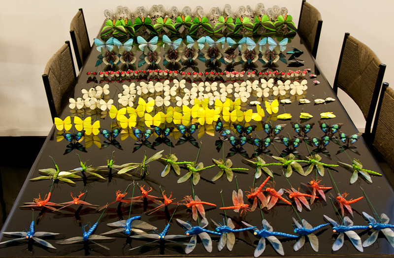 Fake realistic butterfly replicas with mounting wires attached